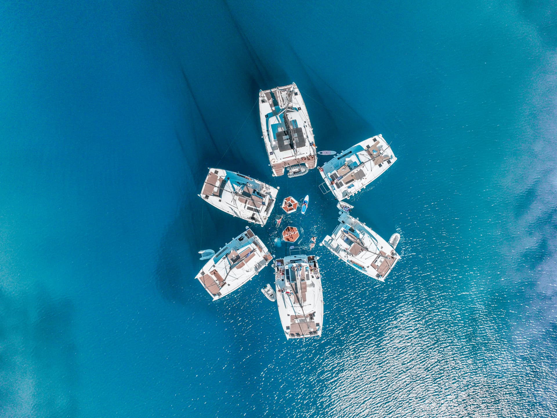 Sails N' Beats flotilla from above in the turquoise Adriatic